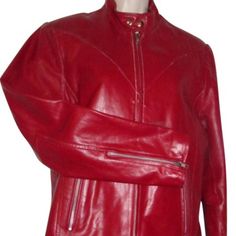 Fabulous, Nwot, Wilsons Leather, Size Small, Structured, True Red Leather, Short, Military Or Motorcycle Jacket With A Zip Front, Snap Closure At The Neck, Zippers At The Cuffs, Two Zip Close Pockets, A Tie Accent At The Bottom, Center In The Back, And A Snap Closure Bottom! Size: S; Bust: 40"; Sleeve Length: 18.5" At Inseam; Length: 13.5"; Bottom: 40"; Shoulders: 16". All Measurements Are Approximate. Classic Red Fitted Leather Jacket, Classic Fitted Red Leather Jacket, Red Fitted Leather Jacket For Formal Occasions, Formal Red Fitted Leather Jacket, Designer Fitted Red Leather Jacket, Designer Red Fitted Leather Jacket, Classic Red Fitted Biker Jacket, Classic Fitted Red Biker Jacket, Classic Red Leather Jacket For Work