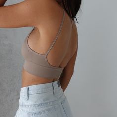 American made from our Seamless fabric this bralette features a low open back. Pull-on style.Cup FitS: 32B. 34A. 34BM: 34B. 36A.36B Trendy Seamless Crop Top For Everyday, Trendy Triangle Crop Top With Built-in Bra, Trendy Seamless Crop Top Sports Bra, Stretch Cropped Bra With Adjustable Straps, Everyday Crop Top With Built-in Bra, Summer Low-cut Sports Bra With Built-in Bra, Trendy Seamless Crop Top Bra, Stretch Everyday Crop Top Bra Friendly, Trendy Stretch Crop Top With Removable Bra Pads