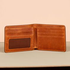 Features: Upgrade your everyday carry with our handcrafted Premium Leather Bifold Wallet, designed for those who appreciate both style and practicality. Made from high-quality, genuine leather, this wallet exudes luxury with its smooth finish and timeless design.  Ample Storage Secure & Convenient Durable Craftsmanship Slim & Compact  Whether you're dressing up for a special occasion or running daily errands, this wallet is a sophisticated addition to your accessories collection.  Care for your leather bifold wallet  Wipe with a soft cloth Use leather cleaner Apply leather conditioner Keep Dry Store in a Cool Place Avoid Overfilling Regular Use %100 Leather Care for your leather bifold wallet  Wipe with a soft cloth Use leather cleaner Apply leather conditioner Keep Dry Store in a Cool Pla Leather Card Holder For Everyday Carry, Leather Trifold Wallet With Waxed Finish For Everyday Use, Rectangular Leather Trifold Wallet For Everyday Use, Rectangular Wallets With Waxed Finish For Everyday Use, Leather Card Holder With Waxed Finish, Leather Trifold Wallet With Card Slots For Everyday, Everyday Carry Leather Card Holder With Smooth Grain, Leather Wallet With Rfid Blocking, Leather Rfid Blocking Card Holder For Everyday