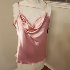 Nwt Tiana 6. Pink Camisole Satiny Shinny Ready For An Evening Out Size Extra Large Cute And Will Pair Well With Dress Pants Or A Skirt.. Made Of 100% Polyester This Should Be Hand Washed Cold, Hung To Line Dry Low Iron. Satin Tank Top With Built-in Bra, Elegant Pink Tops With Built-in Bra, Feminine Tank Top For Night Out, Feminine Satin Sleeveless Camisole, Pink Tank Camisole For Night Out, Feminine Sleeveless Satin Tank Top, Feminine Fitted Camisole Top, Feminine Satin Sleeveless Tank Top, Pink Camisole Top For Night Out