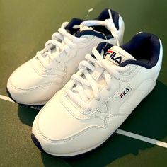 Brand New Size 1 Childrens Sneakers. White With Fila Logos, Navy Lined Interior, And Navy Soles. Perfect For Back To School Shoes! Casual White Running Shoes For Tennis, Sporty Low-top Running Shoes For School, Sporty School Running Shoes With Round Toe, Sporty School Sneakers With Elastic Laces, Sporty Non-slip Sneakers For School, Casual School Running Shoes Lace-up, Casual Low-top Running Shoes For School, Casual Lace-up Running Shoes For School, Casual High-top Running Shoes For School