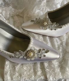 "READY TO SHIP SHOES USA SIZE: 8, AS SHOWN IN PICTURE. COLOR: WHITE/SILVER HEEL: 3 1/2\" REDUCED PRICE!! $138.00 REGULAR PRICE: 159.00 Purse is SOLD separately  link below. Outside US buyers, please goggle a size chart converter or ask for help. Shoes are elegantly trimmed with silver, Please look at all the pictures for details. Please follow the link to buy matching purse: www.etsy.com/listing/126180111/wedding-purse-white-silver  SHOES CANNOT BE RETURNED OR EXCHANGED ALL SALES ARE FINAL.  WHEN IN DOUBT OF RIGHT FIT, INSTEP SHOE MEASUREMENT CAN BE VERIFIED, JUST ASK FOR HELP. I'll make all the efforts to help you have a pleasant shopping experience. INTERNATIONAL ORDERS: The Buyer is responsible for all Customs and Duty Tax Fees on item/s ordered. I suggest you contact and consult, your Classic Silver Low Heel Heels, Classic Silver Low Heel Shoes, Classic Silver Low Heels, Fitted Silver Wedding Shoes With 4-inch Heel, Elegant Silver Court Shoes With 4-inch Heel, Elegant Silver Low Heel Court Shoes, Classic Silver Heels With 4-inch Heel, Fitted Silver Heels With Almond Toe, Elegant Silver Court Shoes With Low Heel