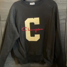 Unisex Small Black Champion Sweatshirt Never Worn But No Tags Black Fall T-shirt For College, Black Varsity T-shirt For Fall, Winter College T-shirt With Logo Print, Collegiate Style Black Long Sleeve T-shirt, Black Long Sleeve Collegiate T-shirt, Black Crew Neck Sweater With Letter Print, Vintage Black Tops With Letter Print, Varsity Long Sleeve Top With Logo Print, Black Varsity Tops For College