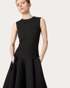 Midi Dress in Luxury Crepe - Rear zip closure - Luxury Crepe (100% Virgin Wool) - Habotai lining - Length: 130 cm / 51.2 in. from the shoulders in an Italian size 40 - The model is 176 cm / 5'9" tall and wears an Italian size 40 - Made in Italy The look of the model is completed by a Valentino Garavani Locò Bag and Valentino Garavani Shoes. Elegant A-line Dress With Side Zipper, Fitted A-line Dress With Invisible Zipper, Chic A-line Dress With Side Zipper, Evening Knee-length Dress With Invisible Zipper, Knee-length Evening Dresses With Invisible Zipper, Structured Knee-length Cocktail Dress, Elegant A-line Mini Dress With Side Zipper, Chic Knee-length Dress With Invisible Zipper, Structured Knee-length Evening Mini Dress