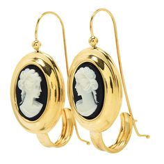 Cameo earrings are relatively hard to find — beautiful cameo earrings are even harder to find! Made of 18K yellow gold, these lovely vintage Muraro earrings each have a bezel set black and white shell cameo at their center, with a carving of a woman in profile with her hair up and tied with a ribbon. Metal: 18K Yellow Gold Victorian Cameo Yellow Gold Earrings, Classic Intaglio Earrings For Formal Events, Classic Intaglio Earrings For Formal Occasions, Classic Intaglio Earrings As A Gift, Elegant Cameo Clip-on Earrings Gift, Formal Cameo Yellow Gold Earrings, Formal Yellow Gold Cameo Earrings, Cameo Drop Earrings For Formal Occasions, Gold Cameo Drop Earrings