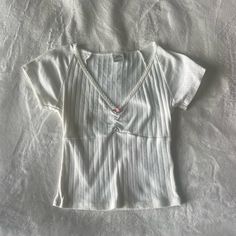 Women’s Urban Outfitters Baby Tee Crop Top; V-Neck With Flower Detail; Size Small; Super Cute Ribbed Pattern With Lace Detail Around Collar; Never Worn; Originally $35 Fitted V-neck Y2k Crop Top, Fitted Y2k V-neck Crop Top, Y2k V-neck Stretch Top, Fitted White Cotton V-neck Top, Casual White Fitted V-neck Top, Cute V-neck Crop Top For Spring, Spring V-neck Cute Crop Top, Y2k Summer V-neck Top, Fitted Cotton V-neck Top For Spring