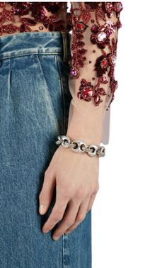 Express your individuality with this Sterling Silver Interlocking G Marina Chain Bracelet from Gucci. Adorned with a three-dimensional flower motif, this bracelet has a vintage look that will add a unique touch to your style. It is 21cm in length and features an antique-effect clasp and engraved details. Perfect for casual wear, this bracelet showcases the finest Italian craftsmanship. Shop our Jewellery Collection. Designer Metal Chain Bracelets, Sterling Silver Jubilee Link Bracelet, Designer Silver Chain Bracelets, Designer Chain Link Metal Jewelry, Designer Metal Chain Link Jewelry, Gucci Sterling Silver Chain Jewelry, Designer Jubilee Bracelet Jewelry In Metal, Gucci Sterling Silver Bracelet, Vintage Style Silver Gucci Jewelry