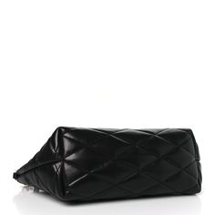 This is a SAINT LAURENT Lambskin Quilted Sade Mini Shoulder Bag in Black. Made from black quilted lambskin leather, this bag features an aged brass chain strap with leather shoulder pads. The top unzips to a black fabric interior with a patch pocket. Shoulder Bag Black, Mini Shoulder Bag, Black Quilt, Aged Brass, Brass Chain, Lambskin Leather, Black Fabric, Chain Strap, Shoulder Pads