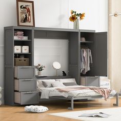 a bedroom with a bed, desk and bookcases in grey color on the floor