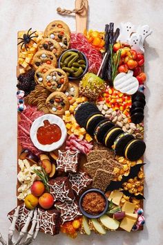 an assortment of food is displayed on a table