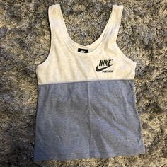 Blue And White Nike Tank Top White Casual Nike Tank Top, Casual White Nike Tank Top, Nike Gray Summer Tops, Nike Summer Gray Tops, Nike Casual Cotton Tank Top, Nike Casual Tank Top For Summer, Nike Tank Top, Gym Shirt, Nike Tank