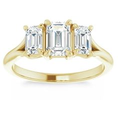 three stone diamond ring in yellow gold