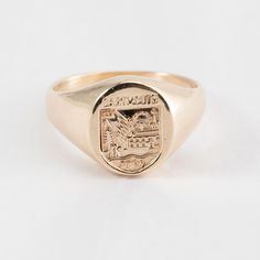 Hi. This is a nice Darmouth College Signet Ring in 14k Yellow Gold. It is marked 14k on the inside of the ring. It has the words "Darthmouth" and "1769". The ring finger size is 5.75. Sorry, we do not resize rings. The weight is 6 grams. Thanks for looking. Antique Dome Ring Stamped 14k As Gift, Classic Gold Cluster Ring Stamped 14k, Antique Round Signet Ring Stamped 14k, Antique 14k Stamped Round Signet Ring, Antique Engraved Ring Hallmarked, Vintage Hallmarked Signet Ring With Round Band, Vintage 14k Gold Signet Ring, Antique Signet Ring For Anniversary With Round Band, Antique Round Signet Ring For Anniversary