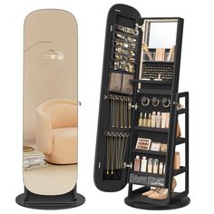 a black and white display case next to a beige chair with makeup, eyeglasses and other items in it