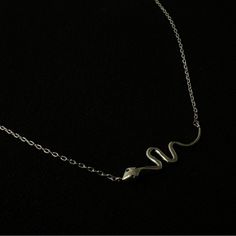 White Gold Dipped Snake Charm 2025 Chinese Zodiac Necklace Celebrate The Elegance And Mystique Of The 2025 Chinese Zodiac With This Stunning White Gold Dipped Snake Charm Necklace. Crafted With Meticulous Attention To Detail, The Snake Charm Symbolizes Wisdom, Grace, And Transformation. Its Lustrous White Gold Dip Adds A Modern Touch, Making It A Versatile Accessory For Any Occasion. The Delicate Chain Beautifully Complements The Charm, Ensuring A Comfortable Fit That Enhances Your Neckline. Thi Sign Making, Zodiac Necklace, Zodiac Necklaces, Delicate Chain, The Snake, Chinese Zodiac, Gold Dipped, Zodiac Sign, Womens Jewelry Necklace