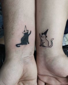 two people with matching tattoos on their arms