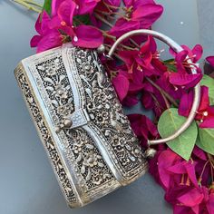 Fabulous ~ Vintage ~ oriental ~ hand chased ~ Heavily silver plated box purse /clutch featuring bird foliage design on front and backside with hand pierced body ~ Most likely Chinese or Strait Chinese piece of art which is made in an around Singapore Dates first to mid 20th century Unmarked Materials : Heavily silver plated on most likely brass as base metal Measurements : Purse box ~ 6 inches x 12 1/2 inches x 3 3/4 inches max height ( including bottom feet ) ~ handle adds 3 1/2 inches in lengt Luxury Silver Rectangular Box Bag, Traditional Rectangular Openable Clutch, Traditional Silver Clutch As Gift, Handmade Silver Clutch As Gift, Silver Handmade Clutch As Gift, Handmade Silver Clutch For Gift, Vintage Silver Rectangular Clutch, Traditional Silver Rectangular Clutch, Handmade Silver Rectangular Clutch