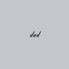 the word dad written in black ink on a gray background