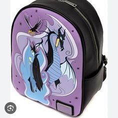 a purple and black backpack with an image of two dragon on it's back