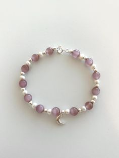 🌷Soft and sweet vibe, original and unique design 🌷Comfortable for everyday wear 🌷Easily Adjustable ✨Bracelet measures approximately 6.3 inches(16cm) long, extended chain options (we'll add it for you): 1) 1 inch (2.5cm) 2) 2 inches (5cm) 🚚FREE SHIPPING on US order over $35!! 🚚FREE SHIPPING on non-US order over $100 with code "FREESP"!! 🤎 This listing is for 1 piece 100% handmade bracelet 🥰 You might find similar style you like: https://www.etsy.com/shop/MoongemCreation?section_id=50863894 Cat Eye Bracelet, Best Friend Bracelet, Friend Bracelet, Cats Eye Stone, Friend Bracelets, Beaded Crafts, Eye Bracelet, Silver Moon, Eye Stone