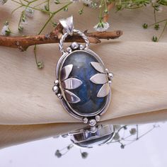 PRODUCT INFORMATION ● Gemstone : Labradorite ● Metal : 925 Sterling Silver ● Purity : 925 Parts Per 1000 ● Stone Shape : Same As Picture ● Stone Category : Cabochon ● Silver Polish : High * Benefits Of Wearing Silver As a metal, silver has significant health benefits that have been used across cultures for centuries. Silver has a proven track record as a powerful antimicrobial agent fighting infections and aiding in cold and flu prevention, wound healing, and more. Silver also helps with interna Spiritual 925 Stamped Jewelry For Memorials, Untreated Labradorite For Jewelry Making, Silver Labradorite Gemstone With Large Stone, Large Silver Labradorite Gemstones, Labradorite Cabochon Gemstones For Gifts, Silver Labradorite Nature-inspired Jewelry, Cabochon Labradorite Gemstones Gift, Nature-inspired Silver Labradorite Jewelry, Silver Cabochon Labradorite Gemstones