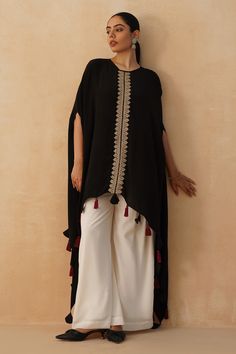 Traditional Kaftan With Tassels, Traditional Tassel Kaftan With Drape, Festive Traditional Kaftan With Tassels, Traditional Tasseled Kaftan, Bohemian Kurta With Tassels For Eid, Festive Kaftan With Tassels In Traditional Drape, Black Kaftan With Dupatta, Black Traditional Drape Kaftan For Festive Occasions, Bohemian Tasseled Kurta For Eid