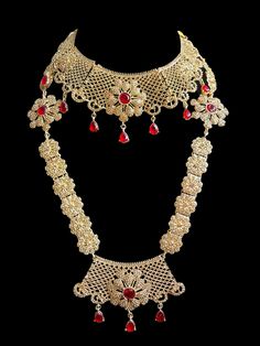 This is the perfect set to give yourself a royal look for your next special occasion! It comes as a full choker, long necklace, passa, earrings and tikka and can be worn separately for a lighter look! 3 Gorgeous colors to pick from ! Elegant Bridal Sets For Traditional Ceremonies, Red Bollywood Jewelry For Traditional Ceremonies, Bollywood Style Red Jewelry For Traditional Ceremonies, Elegant Heavy Necklaces For Traditional Ceremonies, Elegant Heavy Bridal Necklace For Traditional Ceremonies, Red Bridal Sets With Intricate Design For Festivals, Red Bridal Set With Intricate Design For Festivals, Red Bridal Set With Intricate Design For Festive Season, Festive Red Bridal Sets With Intricate Design