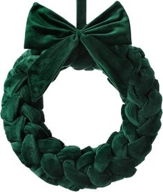 a green wreath with a bow on it