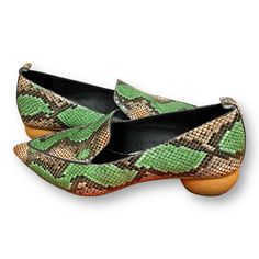 A Classic Loafer Marries Shape And Texture In Unexpected Ways With Its Reptilian-Embossed Upper, Pointy Toe And Spherical Wood Heel. 1 1/4" Heel Appear Unworn , Maybe Tried On. Slip-on Pointed Toe Flats For Galas, Green Heels With Leather Sole And Flat Heel, Green Pointed Toe Casual Loafers, Green Flat Heels With Leather Sole, Green Leather Flat Loafers, Green Leather Low Heel Flats, Spring Leather Shoes With Textured Sole And Pointed Toe, Green Leather Slip-ons With Flat Heel, Green Leather Shoes With Pointed Toe And Rubber Sole