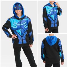 Dc Comics Boys' Blue Beetle Zip-Up Sweatshirt Color Blue & Black Retail $23 Add Some Superhero Flair To Your Child's Cool-Weather Wardrobe With This Dc Comics Blue Beetle Zip-Up Sweatshirt. Designed Like Blue Beetle's Armor In Blue And Black, This Regular-Fit Sweatshirt Is Made Of A Midweight Cotton Blend To Keep Your Young Dc Fan Warm And Toasty. It Boasts Ribbed Trim On The Long Sleeves And Below-Waist Hem For A Neat Look, Along With An Attached Hood Featuring An Eye Mask Design On The Forehea Blue Anime Print Tops For Fan Merchandise, Blue School Tops With Character Print, Blue Character Print School Tops, Blue Character Print Tops For School, Eye Mask Design, Batman Sweatshirt, Superman Hoodie, Dc Comics Shirts, Usa Sweatshirt