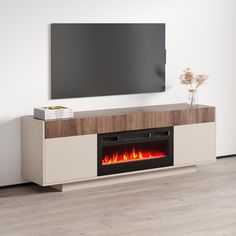 an entertainment center with a fireplace in the middle and a flat screen tv above it