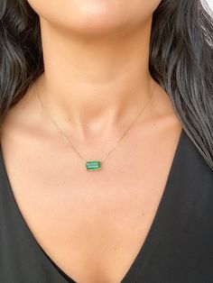 This elegant, timeless necklace features a stunning 3.76ct rich green Zambian emerald that is the focal point of the design. The emerald is set into a classic prong design that can be worn vertically or horizontally on the chain to suit any occasion. With this necklace, you can easily transition from a day in the office to a night on the town. ♥ The pendant measures 7mm in width, 13mm in length, and is 5.5mm thick. ♥ The necklace chain shown is included and measures 17.5" with a slider bead that Emerald Pendant Necklace, Gold Pendant Set, Timeless Necklace, Emerald Necklace Pendant, Zambian Emerald, Halo Pendant, Emerald Pendant, Rich Green, Dramatic Look