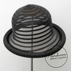 This black traditional shaped fitted hat base is nearly ready to go - simply add a head ribbon, decorate and you're set! Made from poly-braid and sheer crinoline this hat is round in shape and has a thick rolled edge accent. Best suited to a 22" sized head but can be sized up or down by inserting a head ribbon.Measures:29cm in width (11.4 inches)Crown height: 15cm (6 inches)...and for even more millinery supplies you can find us here!:www.etsy.com/shop/PetershamsAll orders are posted daily from Head Ribbon, Blank Hats, Millinery Supplies, Hat Base, Crown Heights, Striped Ribbon, Canterbury, Fitted Hat, Fitted Hats