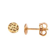 A classic pair of everyday round 18ct gold plated plain stud earrings that should be in everybody's jewellery box. They are light weight, easy to wear, and have a post and butterfly fitting. The handcrafted design has an organic effect to further enhance the look of the stud. The diameter of the earring is 6mm so these are ideal as a first pair to get you started after having had your ears pierced. The studs are 6mm in diameter, have a length of 15mm and weigh 1.3 grams. Earrings fixing: post and butterfly. These earrings are also available in silver. All the raw gemstones we use have been selected for their uniqueness and originality as well their quality and colour. These errings are made from 18ct gold plate on brass. All our earrings are hypoallergenic Luxury gift wrap available Classic Hammered Round Earrings, Yellow Gold Round Disc Earrings For Gift, Classic Round Hammered Earrings, Tarnish Resistant Round Disc Earrings As Gift, Ears Pierced, Gold Disc, Metal Light, Luxury Gift Box, Raw Gemstones