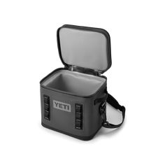 an open yeti cooler on a white background