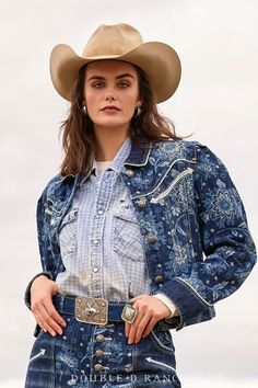 THE DENIM JACKET, DONE A LITTLE DIFFERENTLY! A jean jacket is a staple in every cowgirl’s closet – and you can never have too many. This bold beauty features the custom DDR print inspired by Jesse Chisholm’s old bandana, subtly mosaiced on a classic indigo denim jacket, finished with contrast piping, western welts, and custom concho buttons. color: denim content: 100% cotton embellishments: custom print, contrast piping, DD snaps size: XS-2X fit: slim style number: C3343 collection: Chisholm Tra Western Motifs, Indigo Denim Jacket, Chisholm Trail, Collar Tips, Double D Ranch, Ranch Wear, Beauty Features, Western Jacket, Slim Style