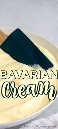 a white bowl filled with cream and a spatula on top of it that says, bavaran cream