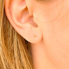 The model is wearing a 1.9mm wide 14K gold ball stud, with a 22 gauge post.• Pair of solid 14K gold stud earrings—You will receive 2 total earrings.• Handcrafted solid 14K gold ball stud earring is 1.9mm round, with a 10mm 22 gauge post. Earrings come with a hypoallergenic silicone earring back.• • Each 14K piece of jewelry is stamped 14K for authenticity.•• Nickel free ••••••••••••••••••••••••••••••••••••••••••••••••CHOOSE YOUR EARRING BACKS:••••••••••••••••••••••••••••••••••••••••••••••• Silic Minimalist Hypoallergenic Yellow Gold Nose Studs, Everyday Minimalist Pierced Nose Studs, Minimalist Everyday Nose Studs, Minimalist Pierced Yellow Gold Nose Studs, Minimalist Yellow Gold Nose Studs, Ball Stud Earrings, Gold Stud Earrings, Gold Stud, Earring Backs