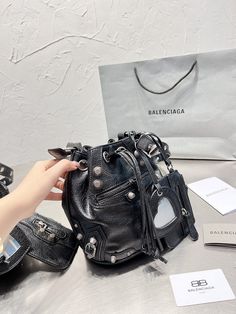 Stylish Carry - BGA2 Bags - 051 A+ Excellent Quality; Contact us if you've any questions in your mind. Balenciaga Logo, Balenciaga Bag, White Rhinestone, Casual Backpack, Satchel Bags, Shoulder Pads, Designing Women, Luxury Bags, Bucket Bag