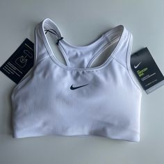 White Xs Nwt Nike Dri-Fit Swoosh Bra Nike Tops For Light Sports, White Moisture-wicking Sports Bra For Training, White Go-dry Functional Sports Bra, White Moisture-wicking Sports Bra For Workout, White Moisture-wicking Sports Bra, White Sports Bra With Medium Support For Workout, White Breathable Fitted Activewear, White Functional Go-dry Sports Bra, Fitted Breathable White Sports Bra