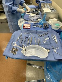 surgical instruments are laid out on a table