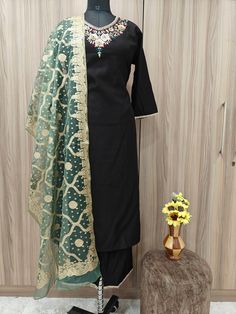 Indian Wedding Wear Salwar Kameez / Indian Ethnic Dress / Plus Size Silk Kurta Dress Traditional Indian Wear / Salwar Kameez Dupatta / Kurti Palazzo Set / Party Wear/ Silk Kurta Set Item Details Black Embroidered Kurta Trousers & Dupatta  KURTA Neck : V Neck Sleeves : 3/4 Sleeves Fabric : Silk Blend Work Type : Embroidered Length : 46" PANT Pant style : Embroided trouser with elastic waist Band Fabric : Silk Blend length : 37" DUPATTA Fabric : Organza Length : 2meter Wash Care : Hand Wash SIZE C Festive Black Chanderi Lehenga, Fitted Embroidered Salwar Kameez For Transitional Season, Fitted Traditional Georgette Sharara, Semi-stitched Black Traditional Wear With Pallu, Semi-stitched Black Churidar With Self Design, Traditional Fitted Sharara For Festive Season, Festive Semi-stitched Georgette Traditional Wear, Fitted Traditional Sharara For Festive Season, Black Unstitched Chanderi Lehenga