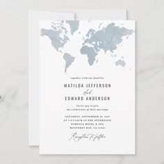 the world map is shown on top of this modern, simple wedding card with blue ink