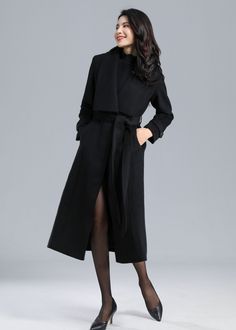 "It is a black midi wool coat, Black has always been the most classic and mysterious color. Having a black wool coat is essential for women. In the snowy winter, this long wool coat will make you look attractive to everyone.The winter wool coat is a Unique design and will let you shine wherever you go, perfect for every occasion. ★★ FEATURES 50% wool blend, 50% fiber, nylon Polyester lining Two side pockets Long sleeve wool coat A-Line wool coat Regular fit wool coat Mid calf wool coat Perfect f Elegant Wool Coat For Office In Solid Color, Elegant Double-breasted Wool Coat, Elegant Long Sweater Coat, Elegant Long Solid Color Sweater Coat, Elegant Long Wool Coat Solid Color, Elegant Long Wool Coat In Solid Color, Chic Black Wool Coat For Office, Chic Black Wool Office Coat, Winter Wool Coat For Office