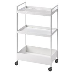 a white shelf with three shelves on wheels