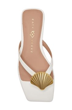 A metallic seashell shines at the vamp of a beach-ready flip-flop secured with a center toe post and grounded by a well-cushioned footbed. Memory foam cushioning Synthetic or synthetic and textile upper/synthetic and textile lining/synthetic sole Imported White Beach Sandals, Bridal Shoes Beach Wedding, Seashell Shoes, Flip Flop Aesthetic, Beach Shoes Women, Fancy Flip Flops, Beaded Wedding Jewelry, Rainbow Heels, Shoe Wishlist