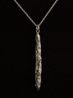 an elegant silver jewelry that represents the Oumuamua. more about Oumuamua on Wikipedia, https://en.wikipedia.org/wiki/%CA%BBOumuamua Oumuamua interstellar object pendant from solid sterling silver hand carved using the lost wax method. Size: 47mm/1.85 inch high. comes on a 18 inch/ 45 cm long sterling silver chain.If you would like a 20 inch / 50 cm long chain please leave me a note in the message to seller form when checking out. If you choose the 14k goldplated option, it comes with an 18 in Elegant Silver Jewelry, Lost Wax, Interstellar, Long Chain, Sterling Silver Chain, Solar System, Silver Chain, Arrow Necklace, Black Friday