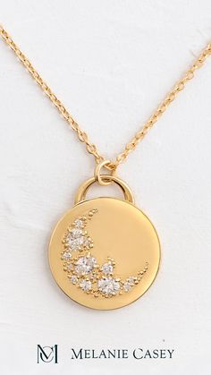 The Skyward Necklace was carefully handcrafted from solid 14k gold and depicts a crescent sweep made of ten round diamonds and three oval diamonds. ﻿The gold pendant is 19.5mm in diameter, 2mm thick and is available on its own or with a 20" rope chain that matches your choice of gold color: yellow, white, or rose. Find more images at melaniecasey.com. Elegant Crescent Rose Cut Diamond Jewelry, Fine Jewelry Diamond Moon Phase, Crescent Rose Cut Diamond Jewelry Gift, Crescent Shaped Rose Cut Diamond Jewelry Gift, Celestial Moon-shaped Jewelry With Rose Cut Diamonds, Celestial Moon Shaped Jewelry With Rose Cut Diamonds, Yellow Gold Celestial Jewelry With Single Cut Diamonds, Elegant Diamond Moon Phase Jewelry, Crescent Yellow Gold Jewelry With Rose Cut Diamonds