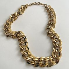 "Vintage 80's heavy gold link chain necklace Adjustable from about 19-1/2\" to 20-1/2\" Good vintage condition This piece is a part of our Little Vintage Paris Collection full of treasures sourced in the fashion capital of the world! We hope that you enjoy wearing and gift-giving these carefully curated items which have arrived just in time for the holiday season! NOTE: Please bear that in mind that, when you purchase vintage, it might not be perfect, but it will be authentic. No returns will be Vintage Oval Link Curb Chain Necklace, Vintage Curb Chain Necklace With Oval Links, Vintage Gold-tone Oval Link Necklace, Vintage Style Chunky Chain Necklace As Gift, Vintage Chunky Chain Necklace As Gift, Retro Gold Jewelry With Adjustable Chain, Costume Jewelry Metal Chunky Chain Necklace, Costume Jewelry Chunky Chain Necklace, Chunky Chain Metal Necklace In Costume Jewelry Style