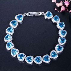 If you are looking for a fine jewelry which looks sepecial, precious stone please consider cubic zirconia in Wedding Bracelet Jewelry Purple, Light Blue Green, Cz Jewelry, Silver Charm Bracelet, Hand Chain, Tennis Bracelet Diamond, Party Jewelry, Cz Diamond, Crystal Heart